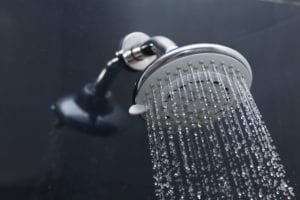 a shower head runs hot water | cherry hill plumber